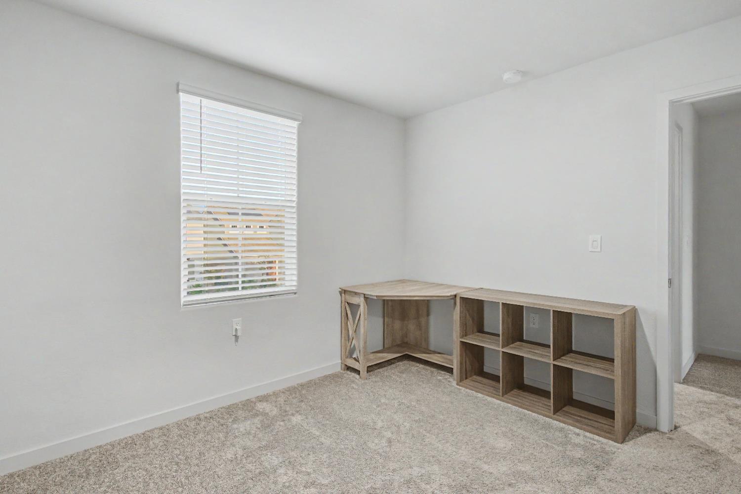 4119 Anise Court Merced, CA 95348 - Photo 21 of 27 a view of an empty room with a window