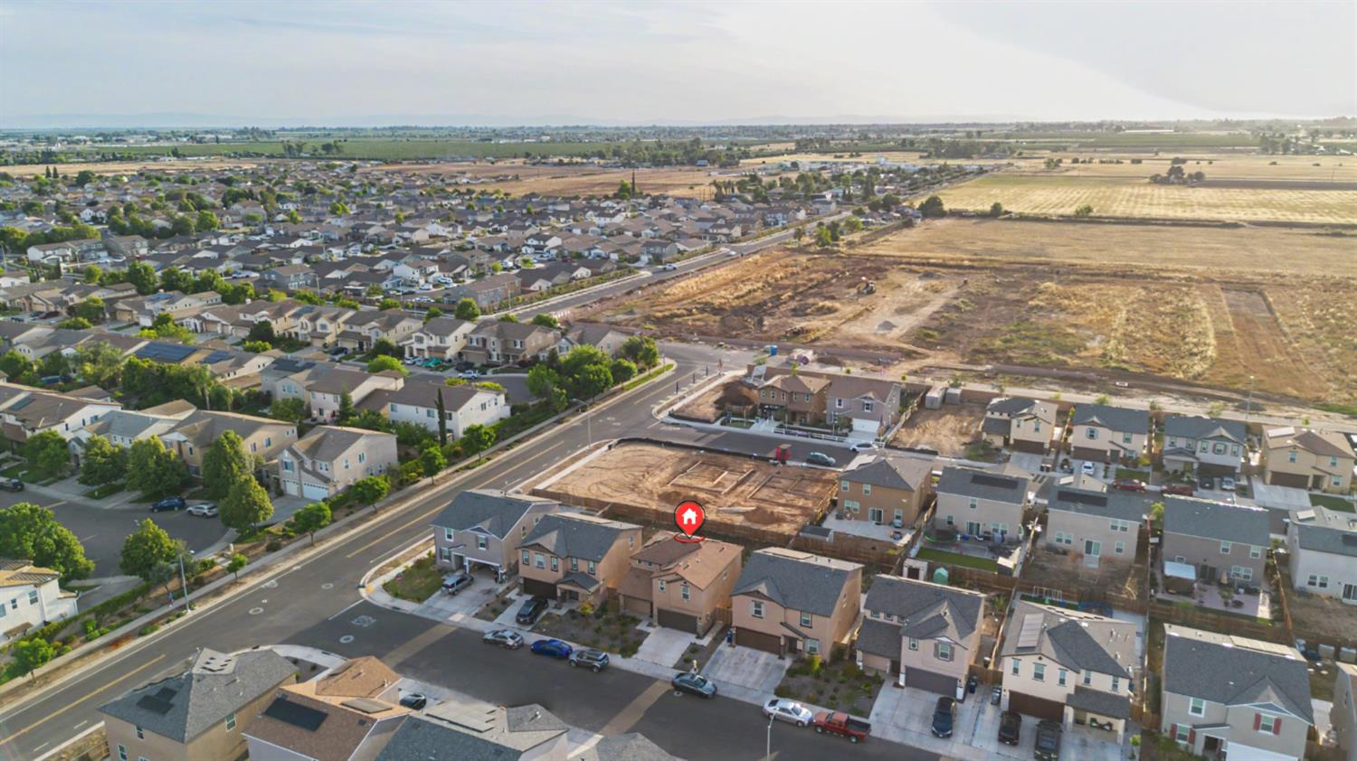 4119 Anise Court Merced, CA 95348 - Photo 27 of 27 an aerial view of residential building and lake