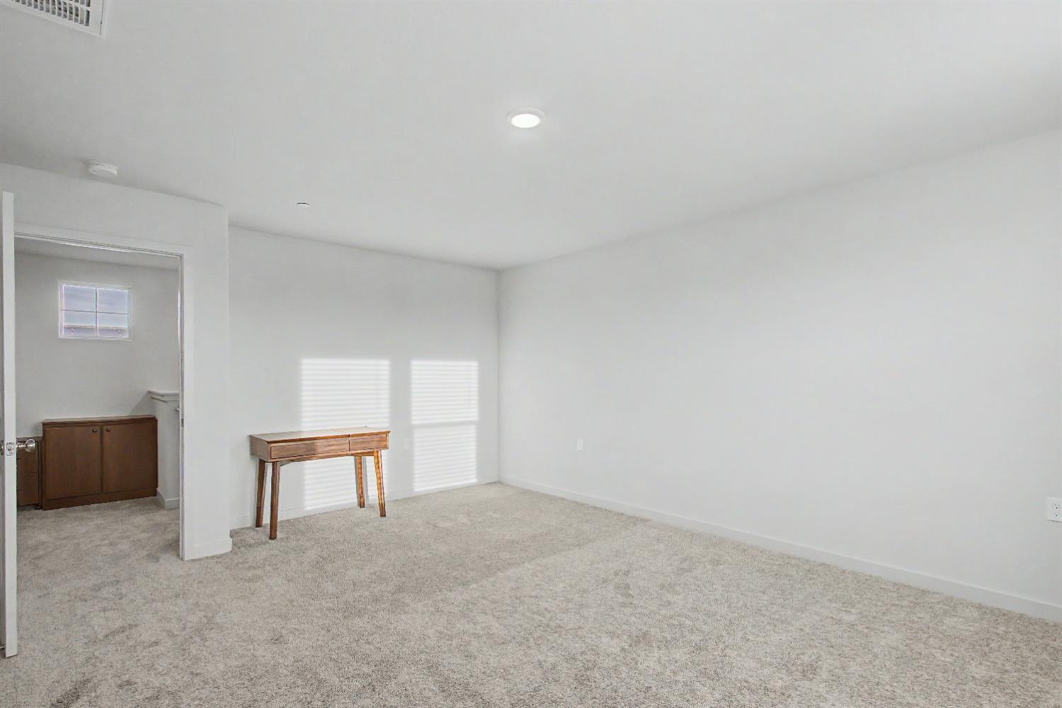 4119 Anise Court Merced, CA 95348 - Photo 10 of 27 a view of an empty room and window