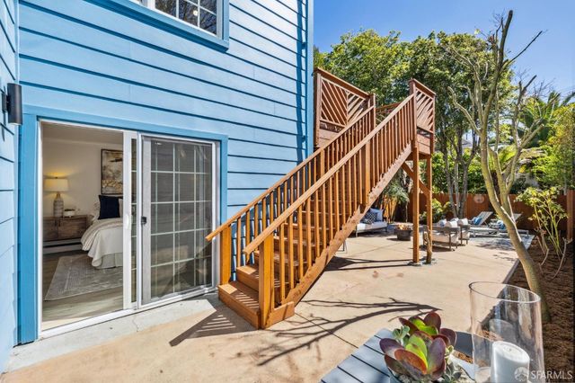 a utility room with sink dryer and washer