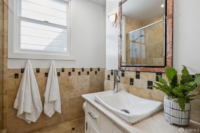 an aerial view of a city with lots of residential buildings