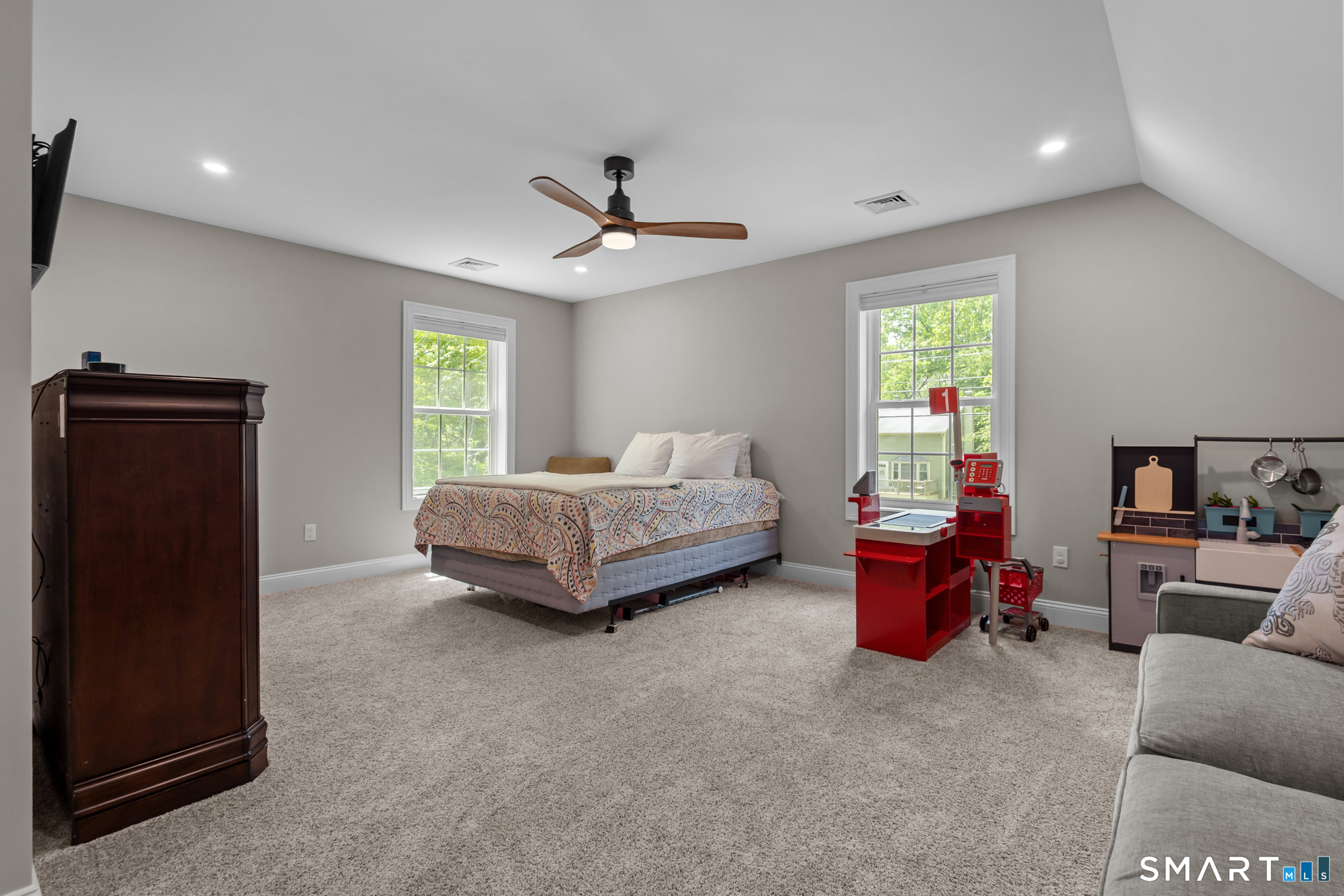2 Martys Way Gales Ferry, CT 06335 - Photo 26 of 40 a spacious bedroom with a bed and a couch