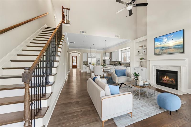 6454 Meridian Way Atlanta, GA 30328 - Photo 19 of 63 a living room with furniture and a fireplace