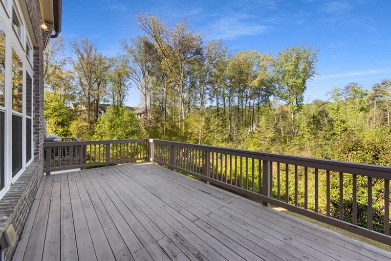 6454 Meridian Way Atlanta, GA 30328 - Photo 21 of 63 a view of a balcony with wooden floor