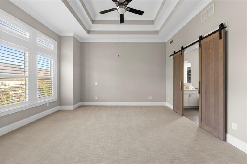 6454 Meridian Way Atlanta, GA 30328 - Photo 23 of 63 a view of an empty room with a window