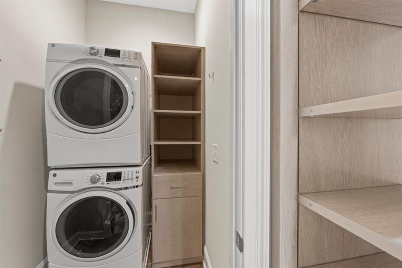 6454 Meridian Way Atlanta, GA 30328 - Photo 27 of 63 a utility room with dryer and washer
