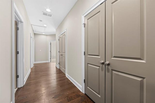 a view of room with window and ceiling fan