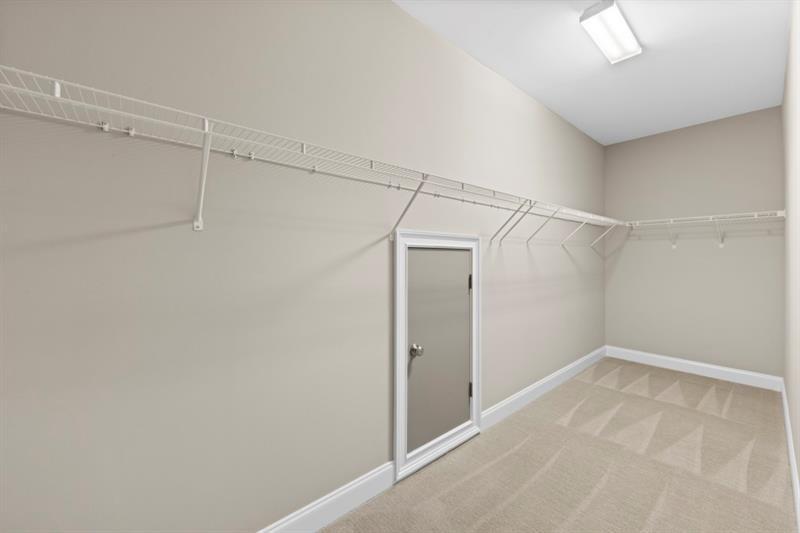 6454 Meridian Way Atlanta, GA 30328 - Photo 32 of 63 a view of a room with racks on the wall