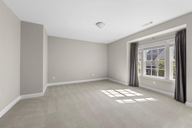 6454 Meridian Way Atlanta, GA 30328 - Photo 36 of 63 a view of an empty room with a window