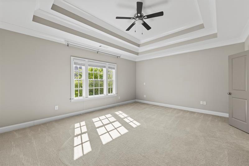 6454 Meridian Way Atlanta, GA 30328 - Photo 37 of 63 a view of room with window and ceiling fan