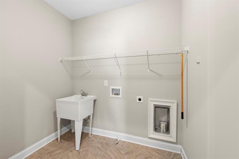 6454 Meridian Way Atlanta, GA 30328 - Photo 41 of 63 a view of a hallway with seating area