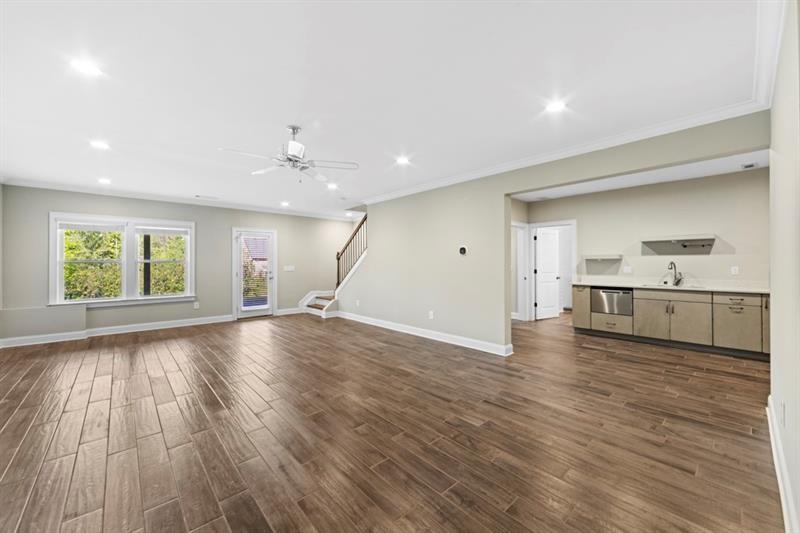 6454 Meridian Way Atlanta, GA 30328 - Photo 44 of 63 a view of a kitchen with wooden floor and a window