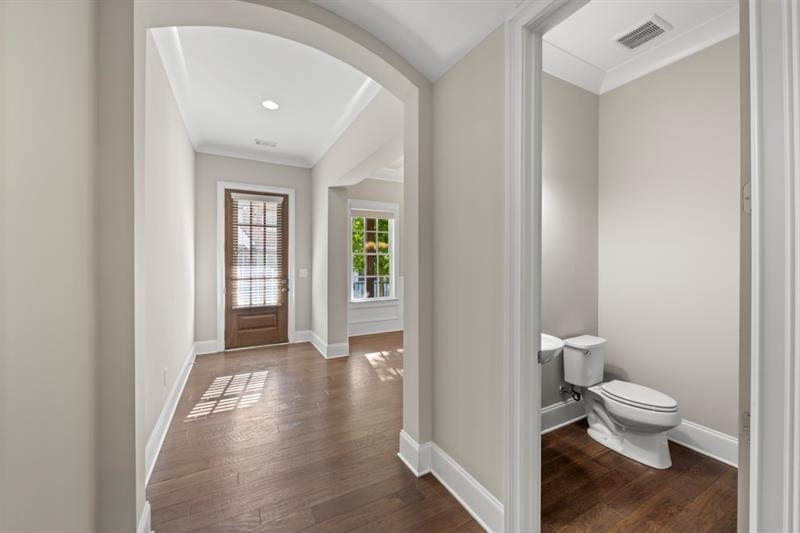 6454 Meridian Way Atlanta, GA 30328 - Photo 7 of 63 a bathroom with a toilet