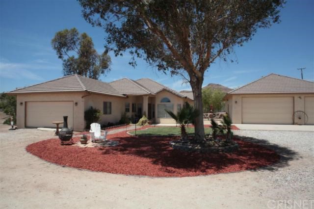 32001 Trail Road Agua Dulce, CA 91390 - Photo 1 of 1 Front view of the home with attached two car garage and detached 6 car garage.