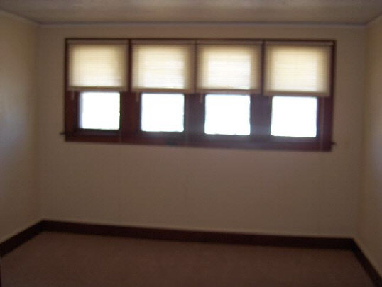 2126 Rural Street Rockford, IL 61107 - Photo 4 of 6 an empty room with a window