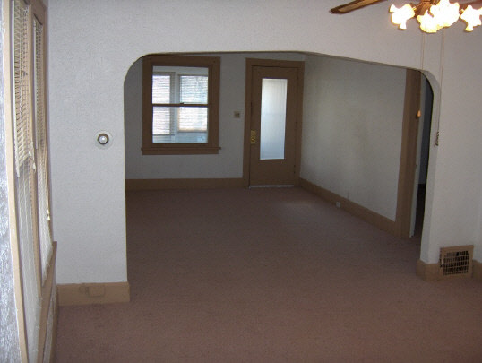 2126 Rural Street Rockford, IL 61107 - Photo 6 of 6 an empty room with windows and closet
