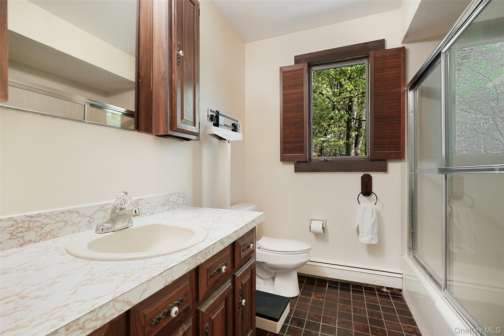 334 Pine Brook Road Pound Ridge, NY 10506 - Photo 15 of 28 a bathroom with a sink and a mirror