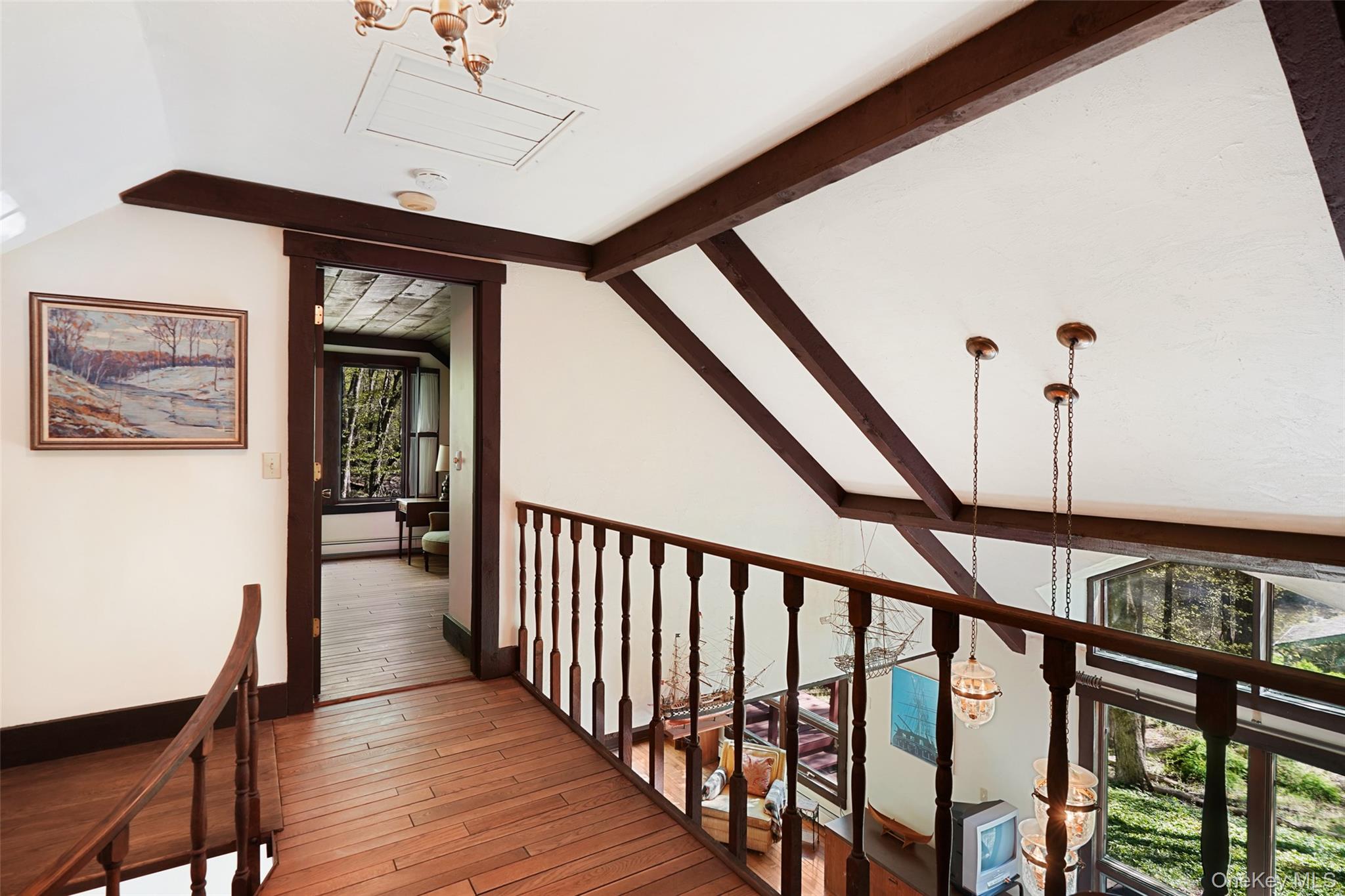 334 Pine Brook Road Pound Ridge, NY 10506 - Photo 17 of 28 a view of an entryway wooden floor and an floor to ceiling window