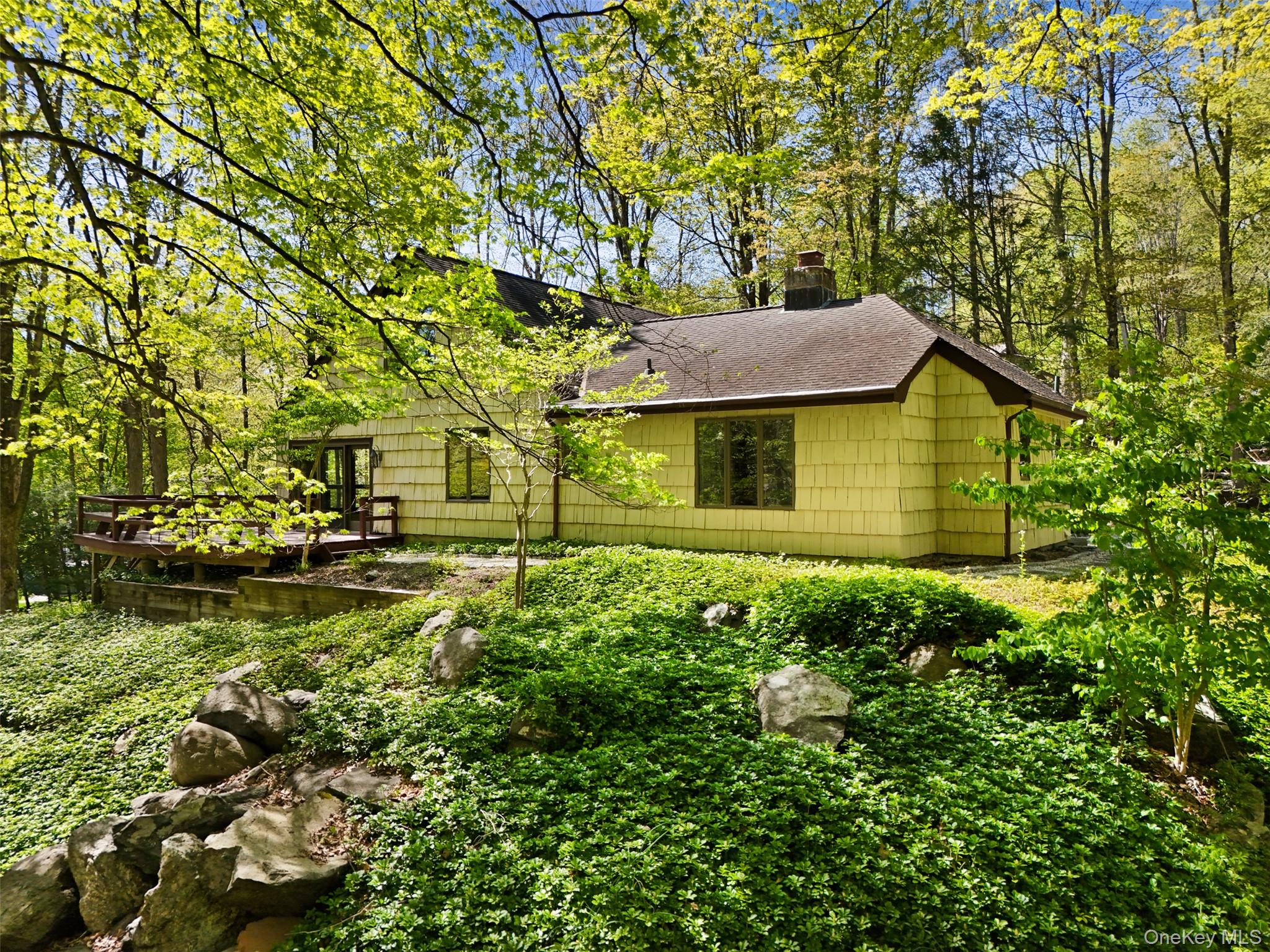 334 Pine Brook Road Pound Ridge, NY 10506 - Photo 23 of 28 a view of a yard in front of house