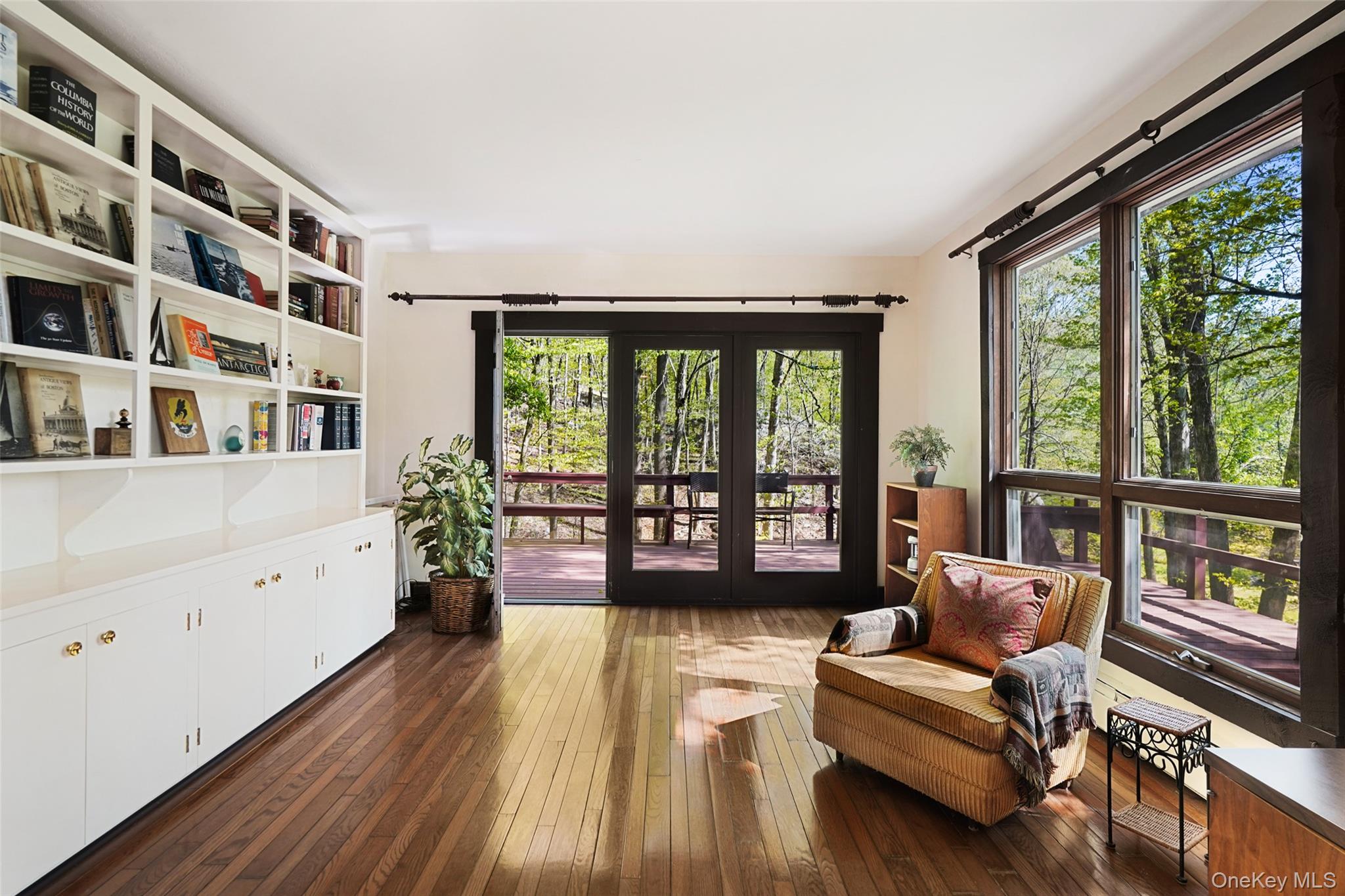 334 Pine Brook Road Pound Ridge, NY 10506 - Photo 7 of 28 a living room with furniture and a large window