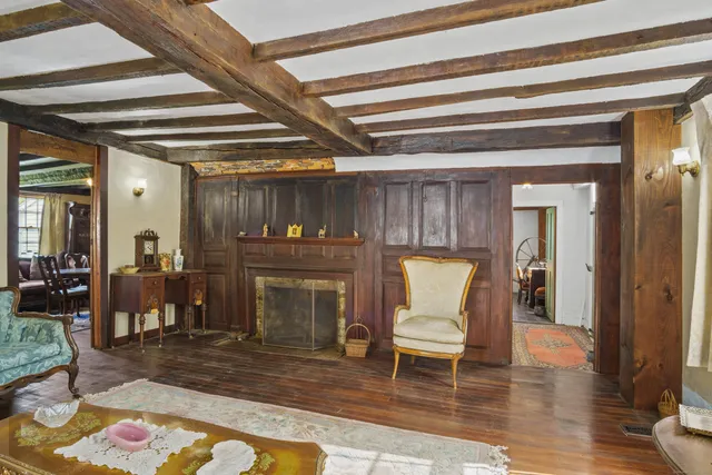 a view of a hallway with seating area