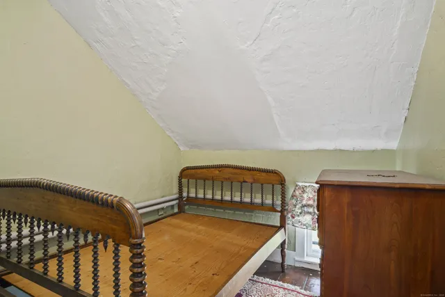 a bathroom with a sink a toilet and bathtub