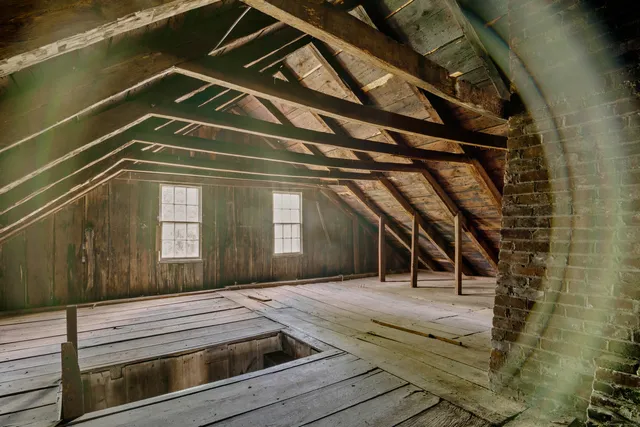 a living room with furniture a washer and dryer