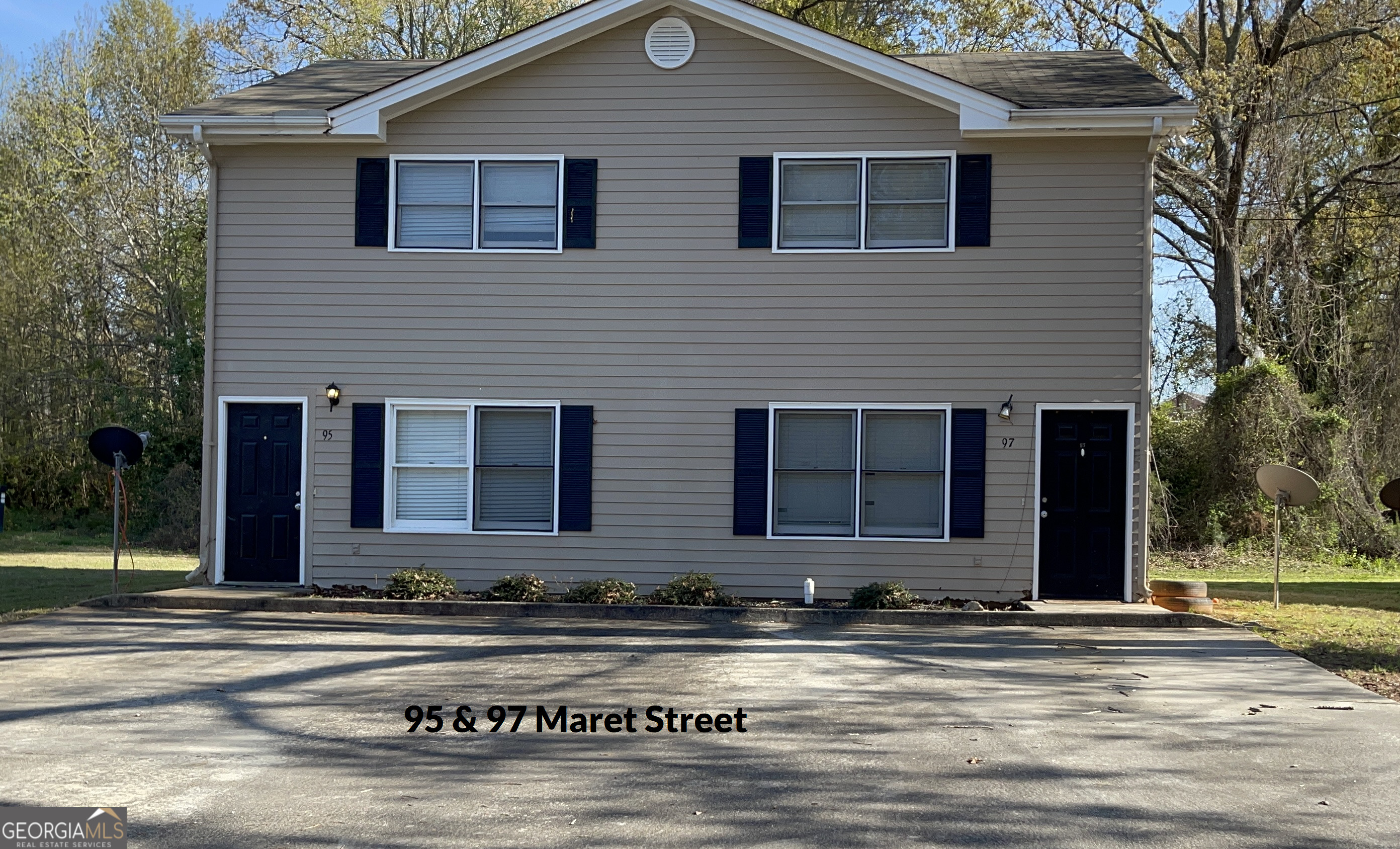 a front view of house with a yard