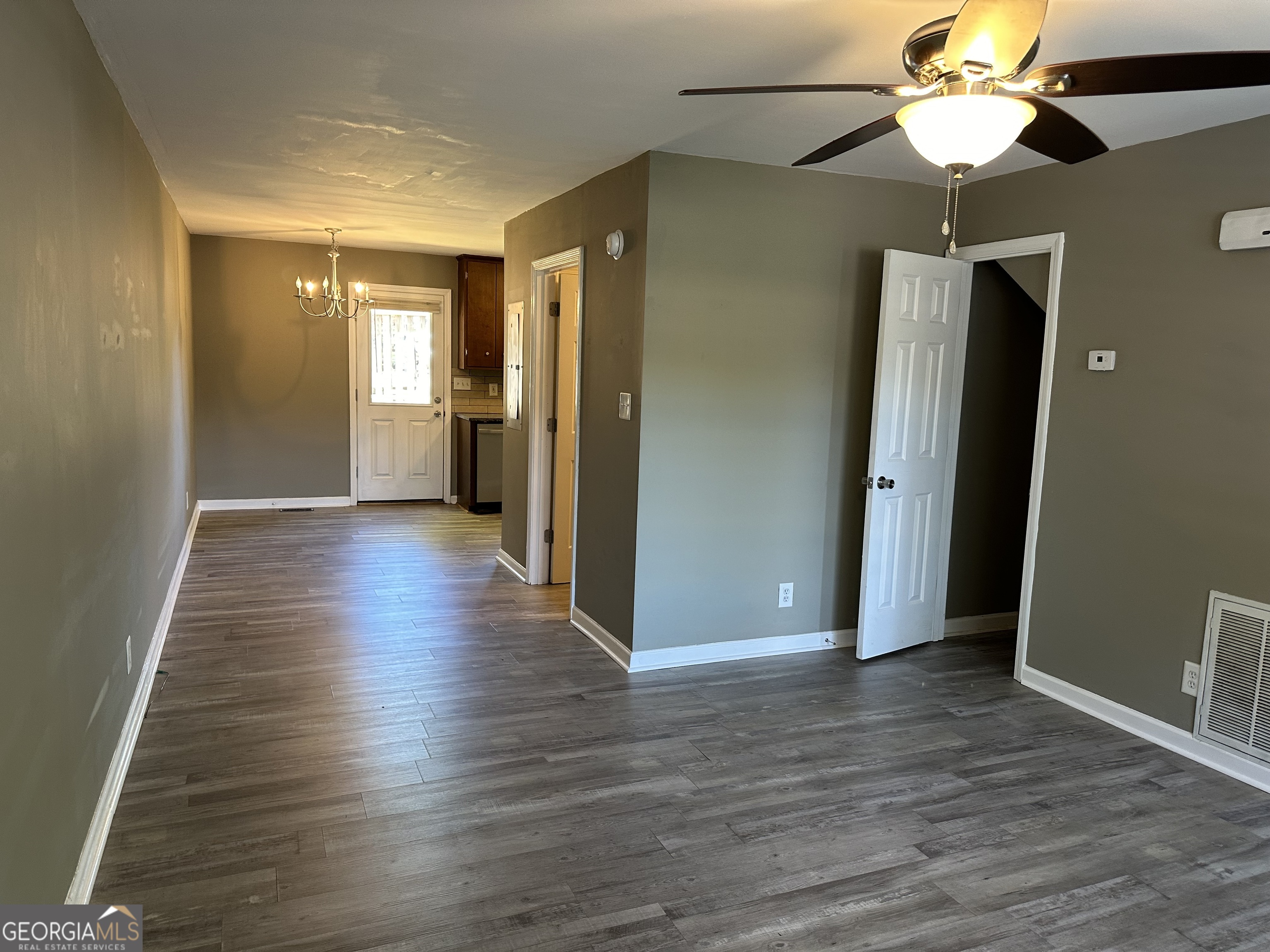 205 Maret Street Hartwell, GA 30643 - Photo 18 of 38 a view of a hallway with wooden floor