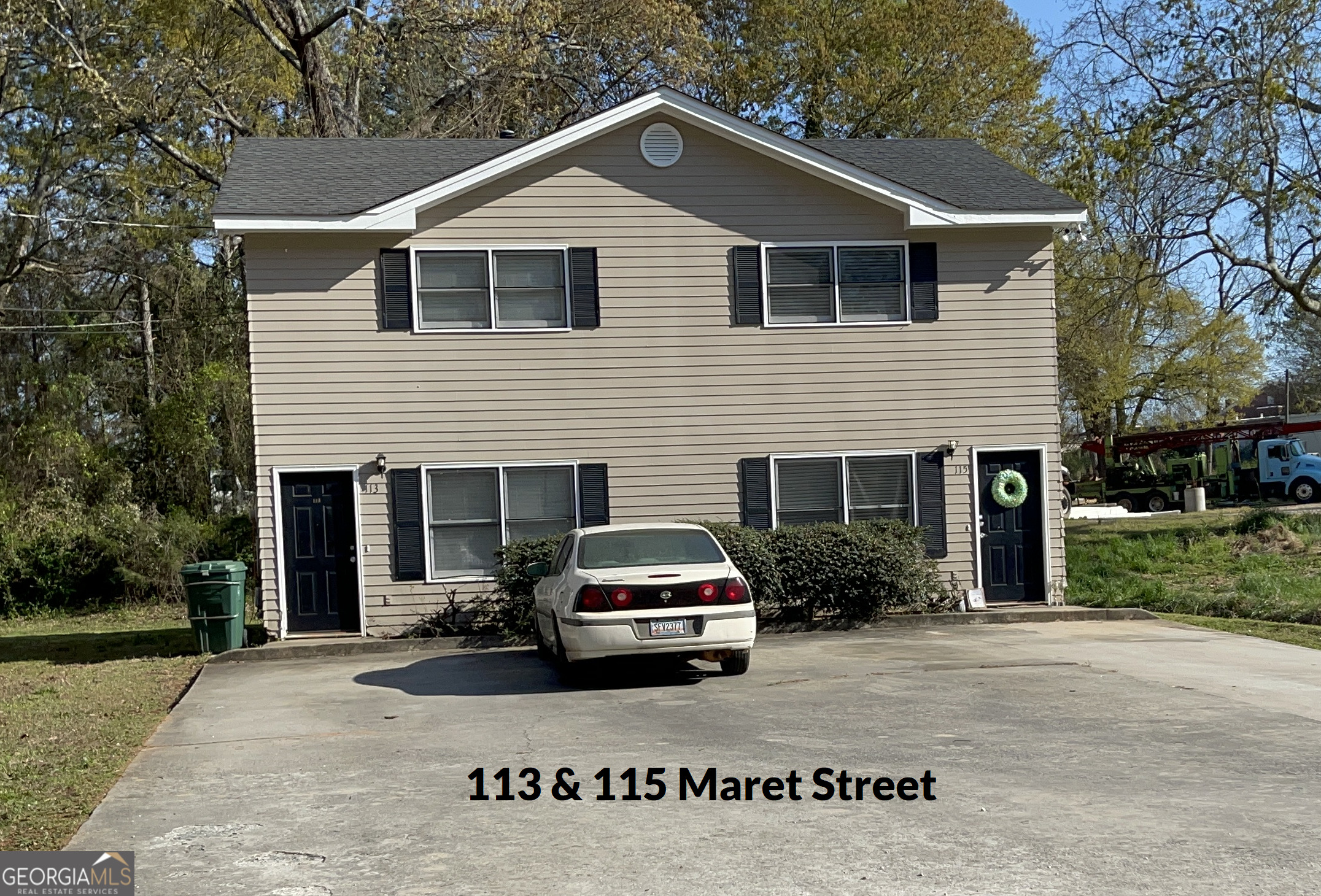 205 Maret Street Hartwell, GA 30643 - Photo 2 of 38 a car parked in front of white house