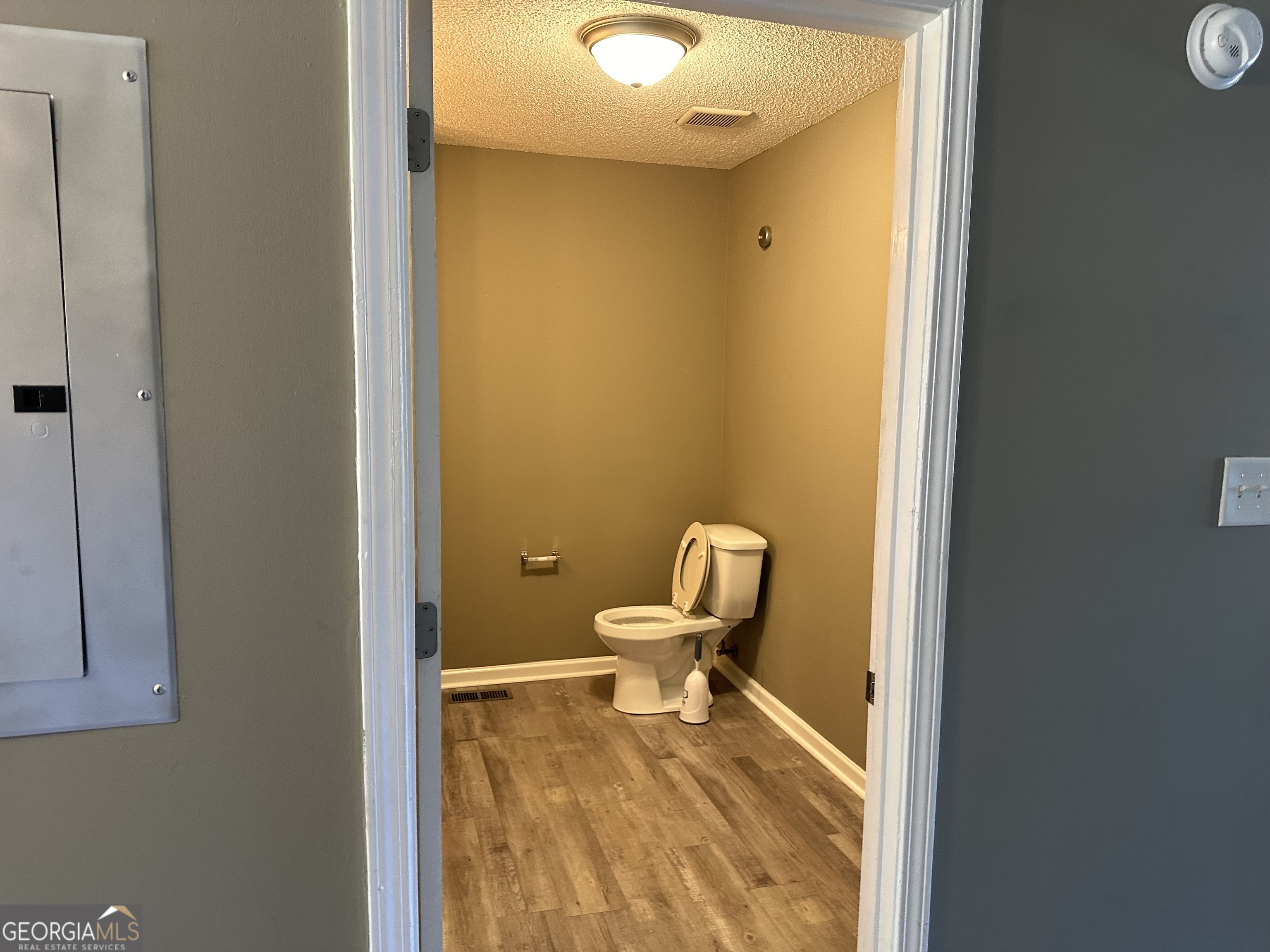 205 Maret Street Hartwell, GA 30643 - Photo 22 of 38 a bathroom with a toilet