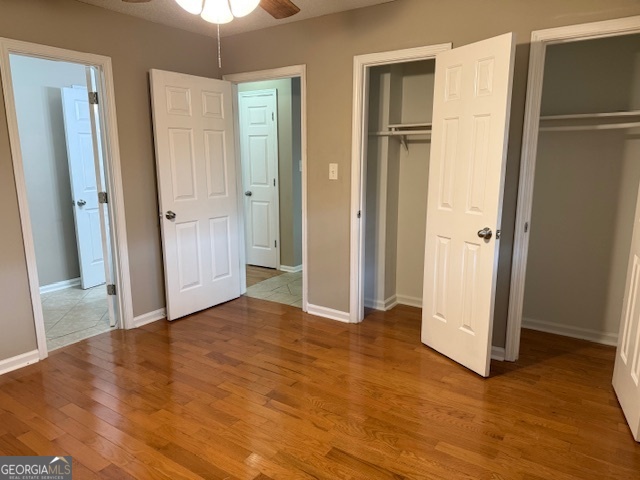 205 Maret Street Hartwell, GA 30643 - Photo 31 of 38 a view of an empty room with wooden floor and a window