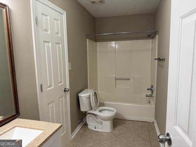205 Maret Street Hartwell, GA 30643 - Photo 33 of 38 a white toilet sitting next to a bathroom sink