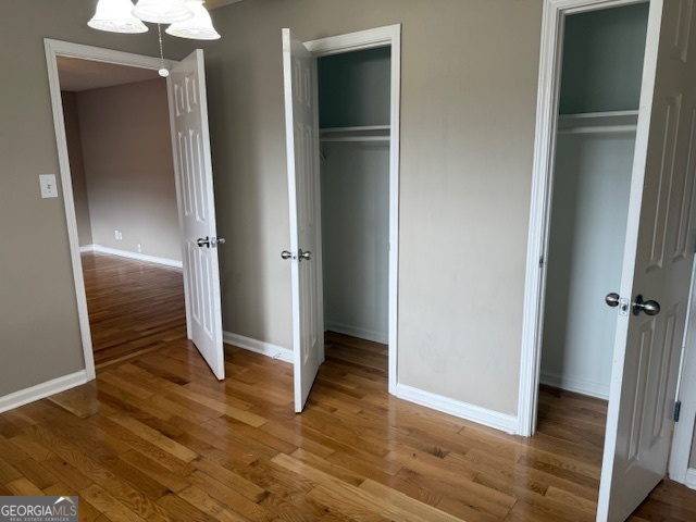 205 Maret Street Hartwell, GA 30643 - Photo 35 of 38 an empty room with wooden floor and closet