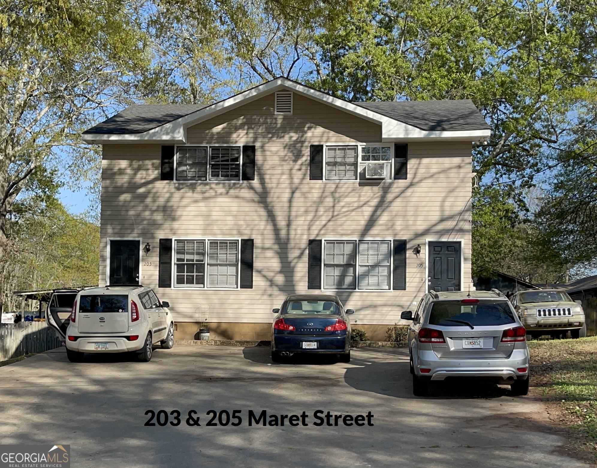205 Maret Street Hartwell, GA 30643 - Photo 6 of 38 a front view of a house with cars parked