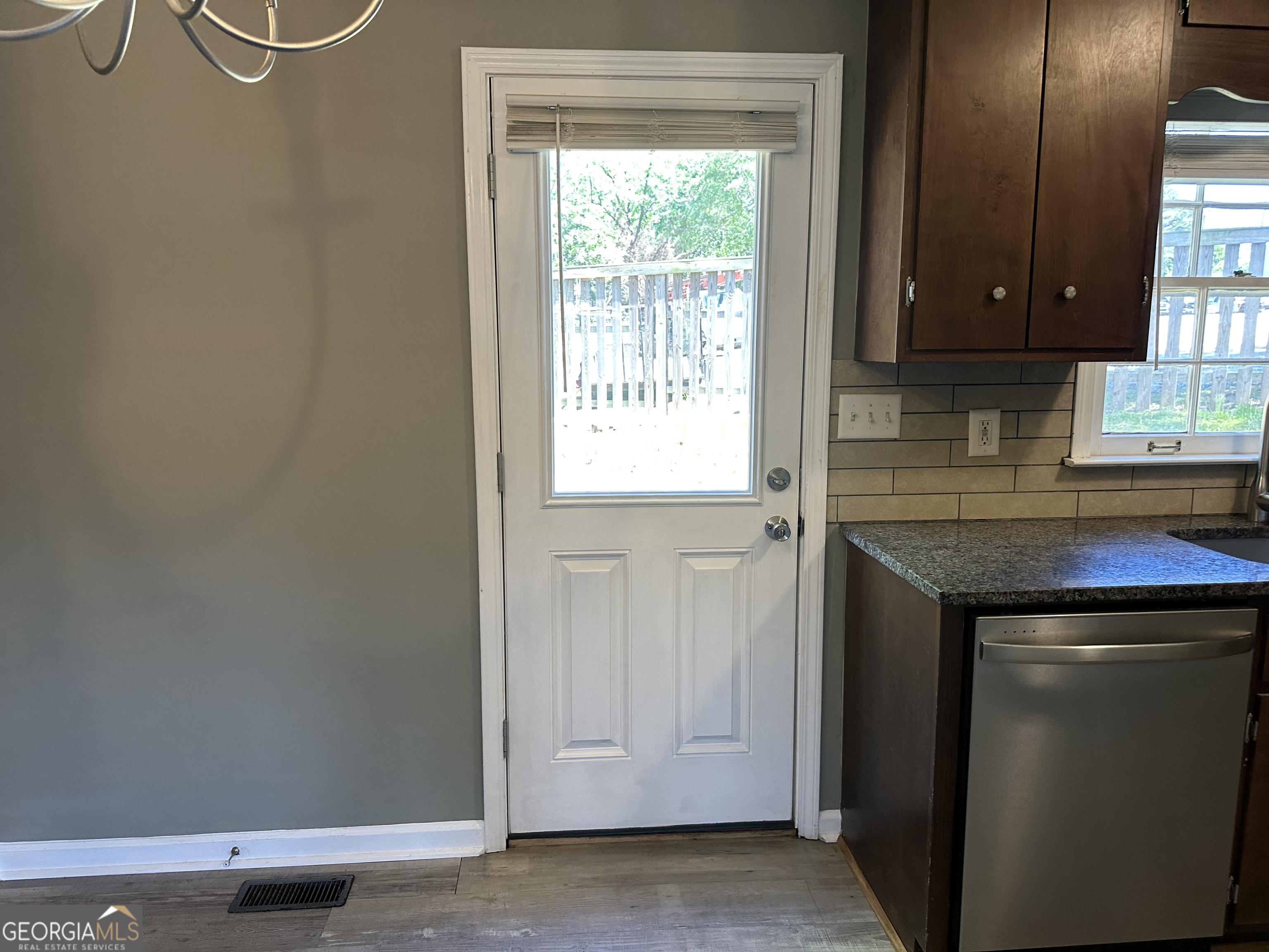 205 Maret Street Hartwell, GA 30643 - Photo 9 of 38 a kitchen with a sink and a window