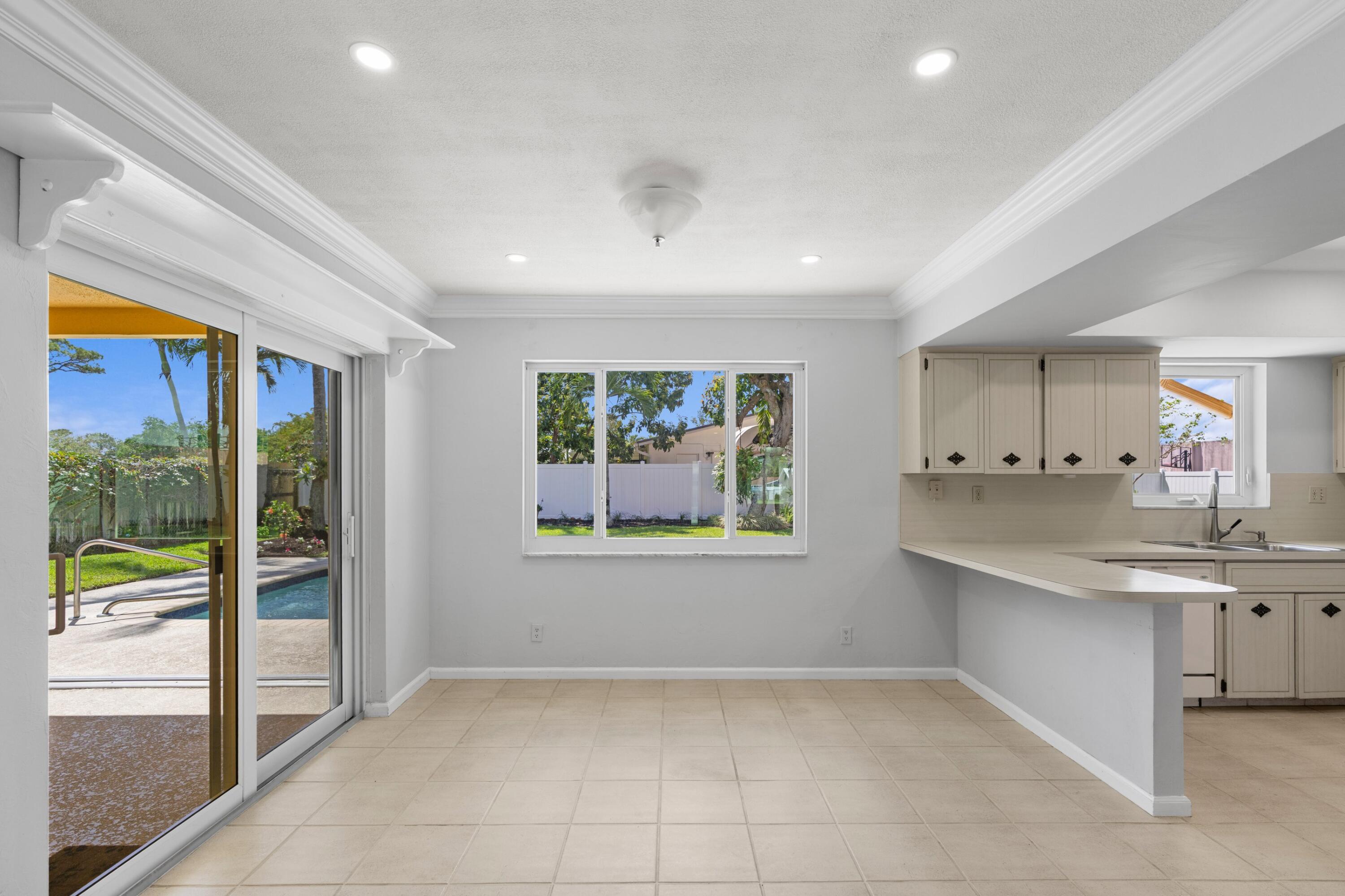 1570 Southwest 10th Street Boca Raton, FL 33486 - Photo 7 of 40 Kitchen / Florida Room