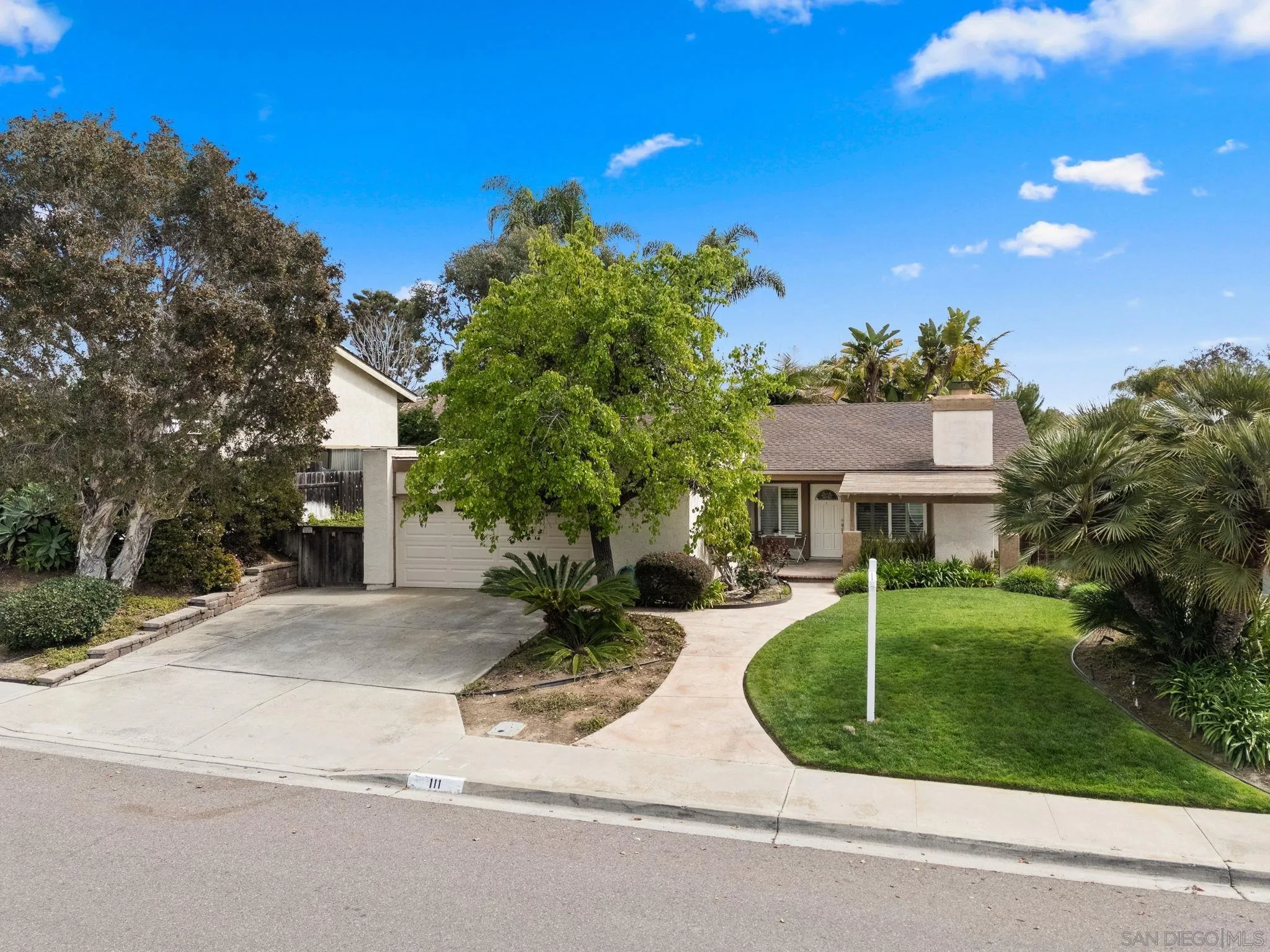 111 Little Oaks Road Encinitas, CA 92024 - Photo 22 of 25 front view of a house with a yard