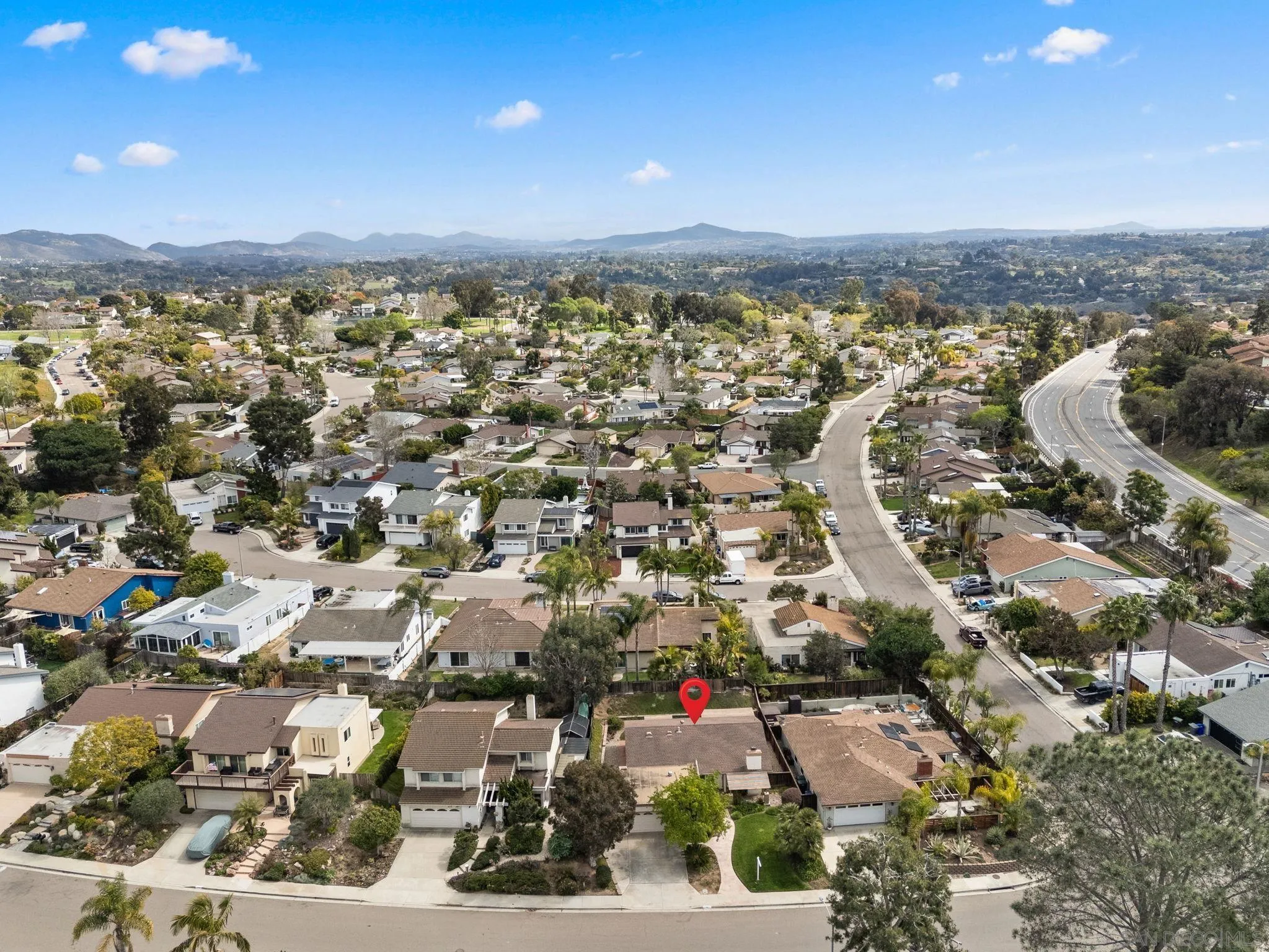 111 Little Oaks Road Encinitas, CA 92024 - Photo 24 of 25 an aerial view of a city with lots of residential buildings and mountain view in back