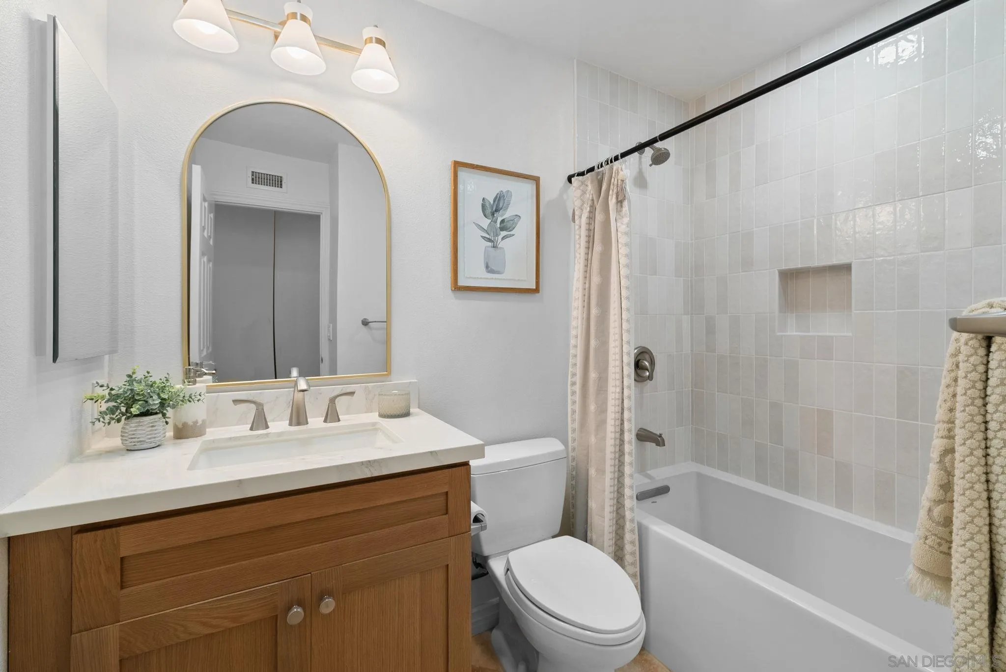 111 Little Oaks Road Encinitas, CA 92024 - Photo 8 of 25 a bathroom with a sink a toilet and shower