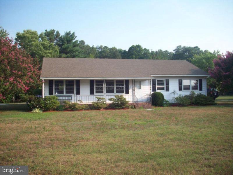26213 Porter Mill Road Hebron, MD 21830 - Photo 1 of 1 a front view of a house with a yard