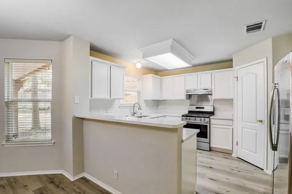 $430,000 | 2121 Desco Drive, Austin, TX 78748