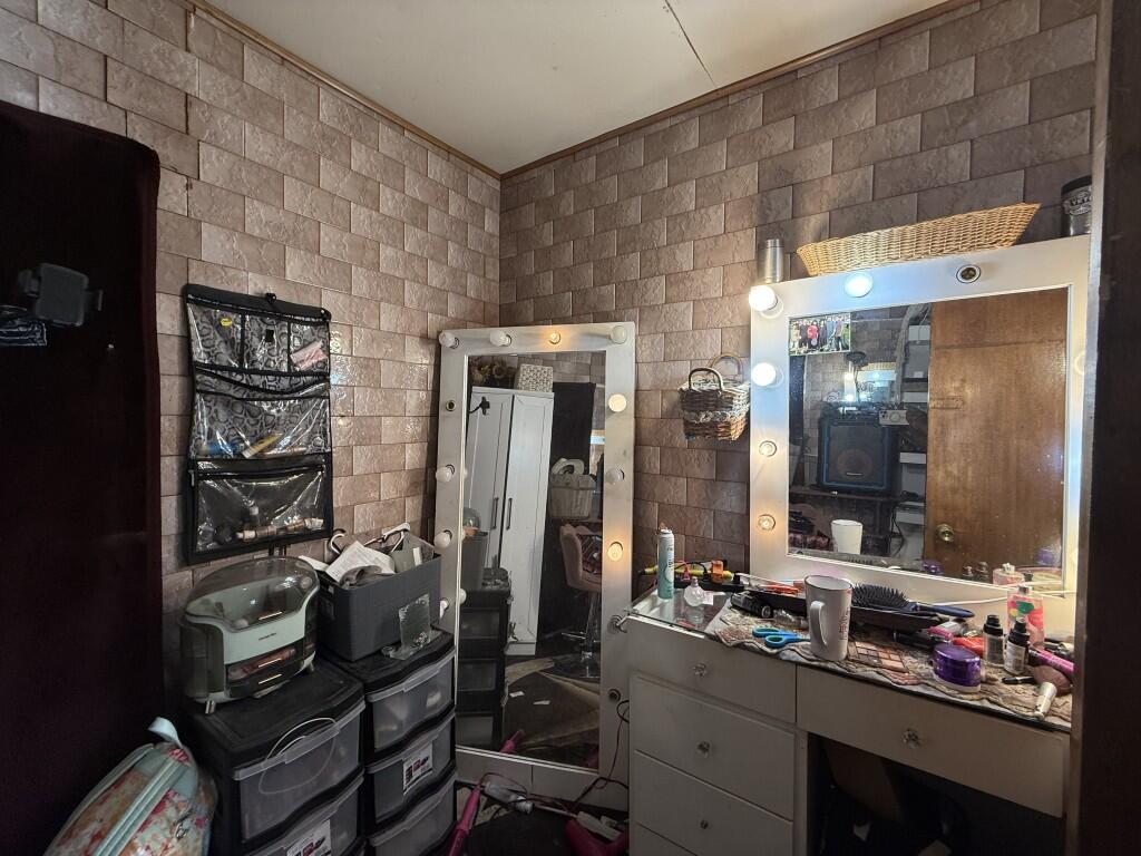 311 Northeast 3rd Seminole, TX 79360 - Photo 14 of 21 a view of a room with gym equipment