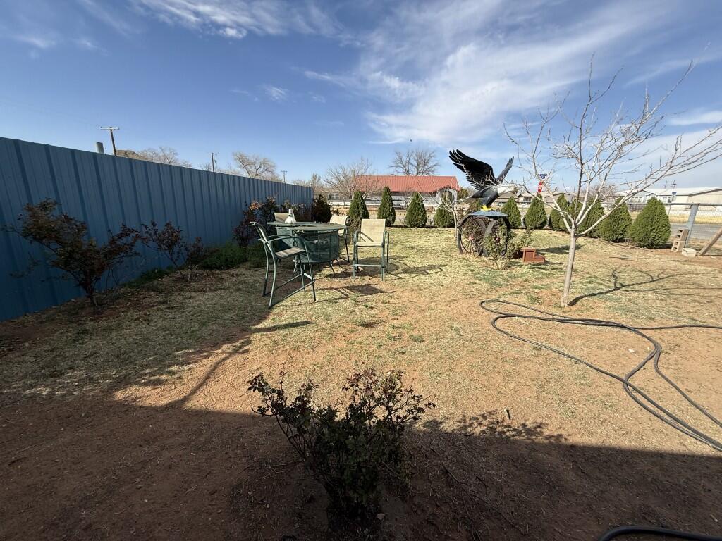 311 Northeast 3rd Seminole, TX 79360 - Photo 19 of 21 a view of a backyard