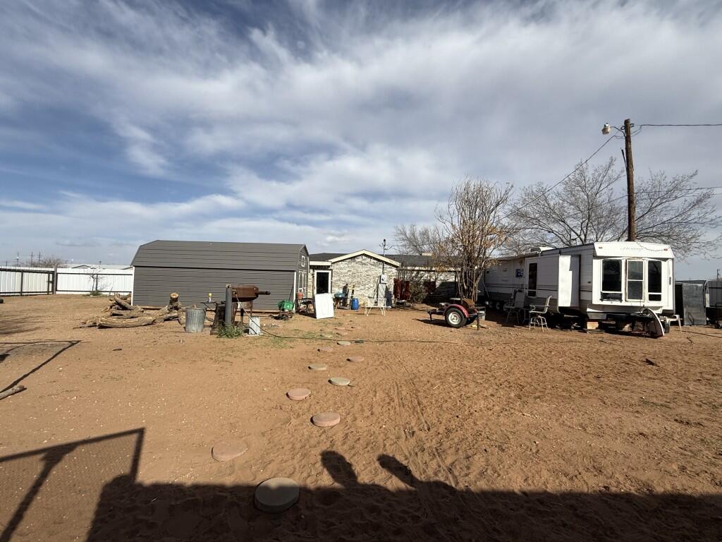 311 Northeast 3rd Seminole, TX 79360 - Photo 20 of 21 a front view of a house with cars parked