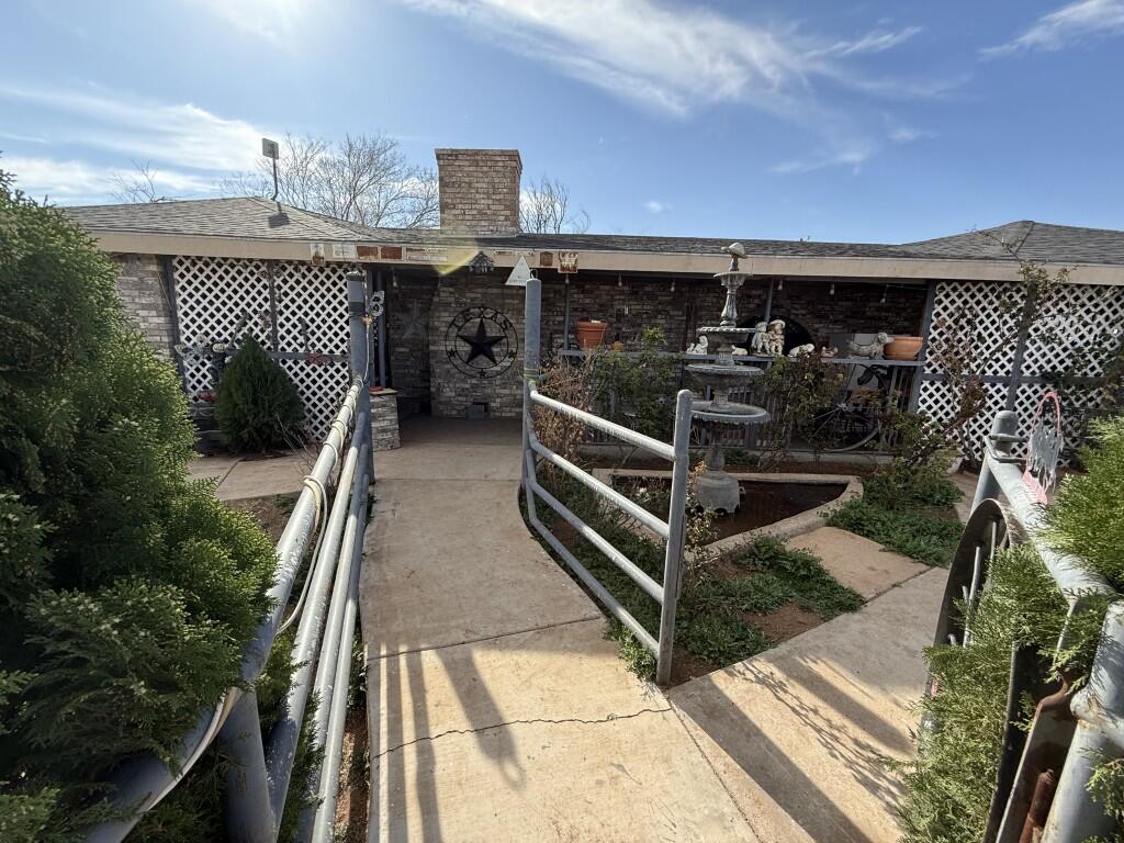 311 Northeast 3rd Seminole, TX 79360 - Photo 2 of 21 a view of balcony with furniture