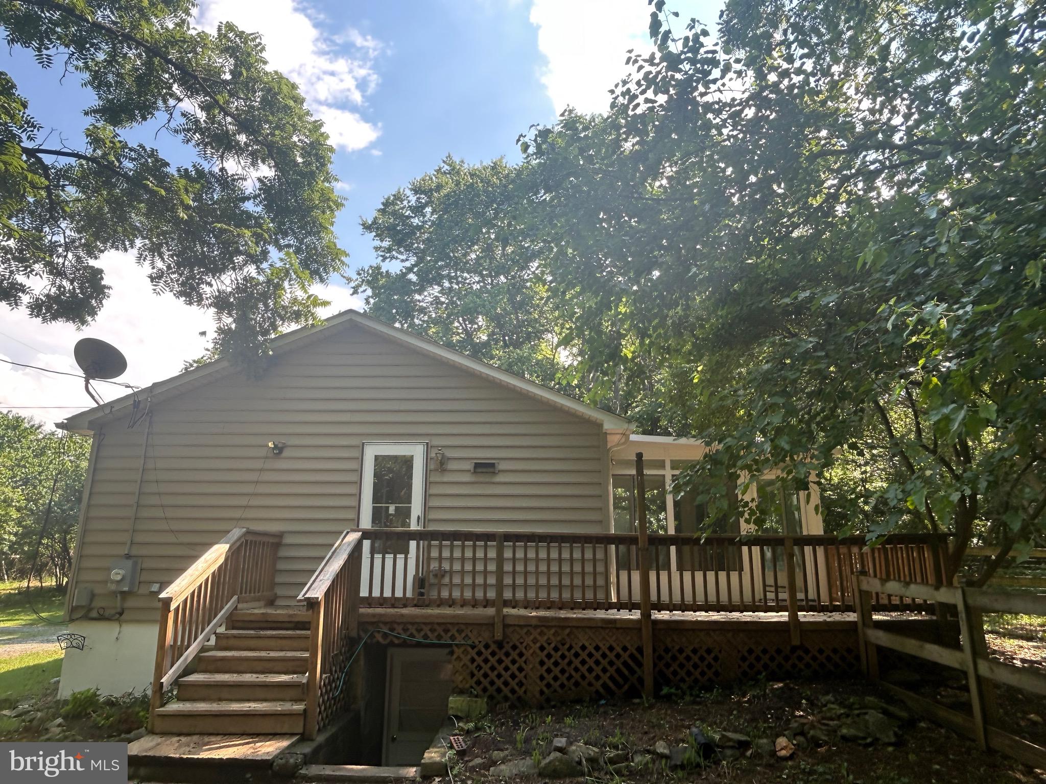 513 Russell Road Berryville, VA 22611 - Photo 44 of 53 The deck wraps around the home