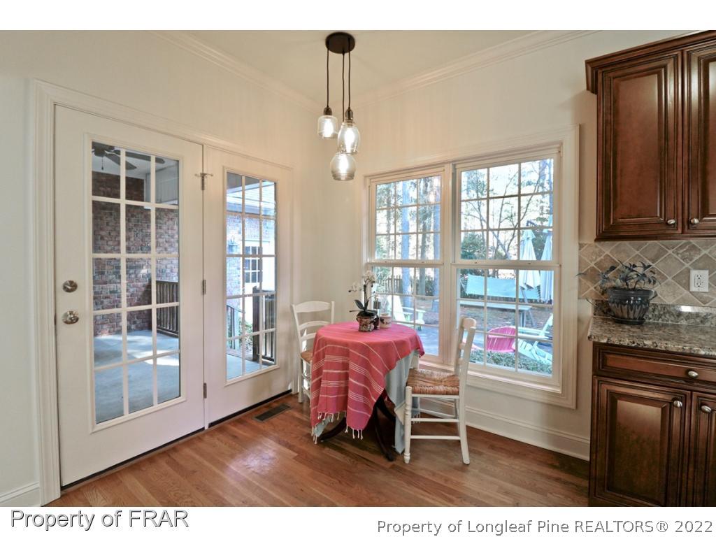 150 Lost Tree Road Pinehurst, NC 28374 - Photo 15 of 36 a dining room with furniture and window