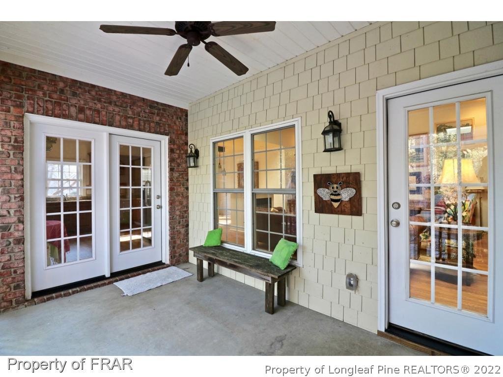 150 Lost Tree Road Pinehurst, NC 28374 - Photo 19 of 36 a living room with furniture and a window