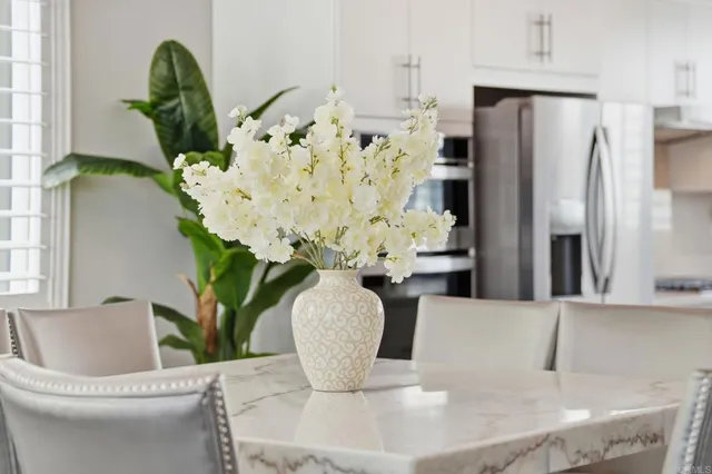 a bathroom with a sink mirror and toilet